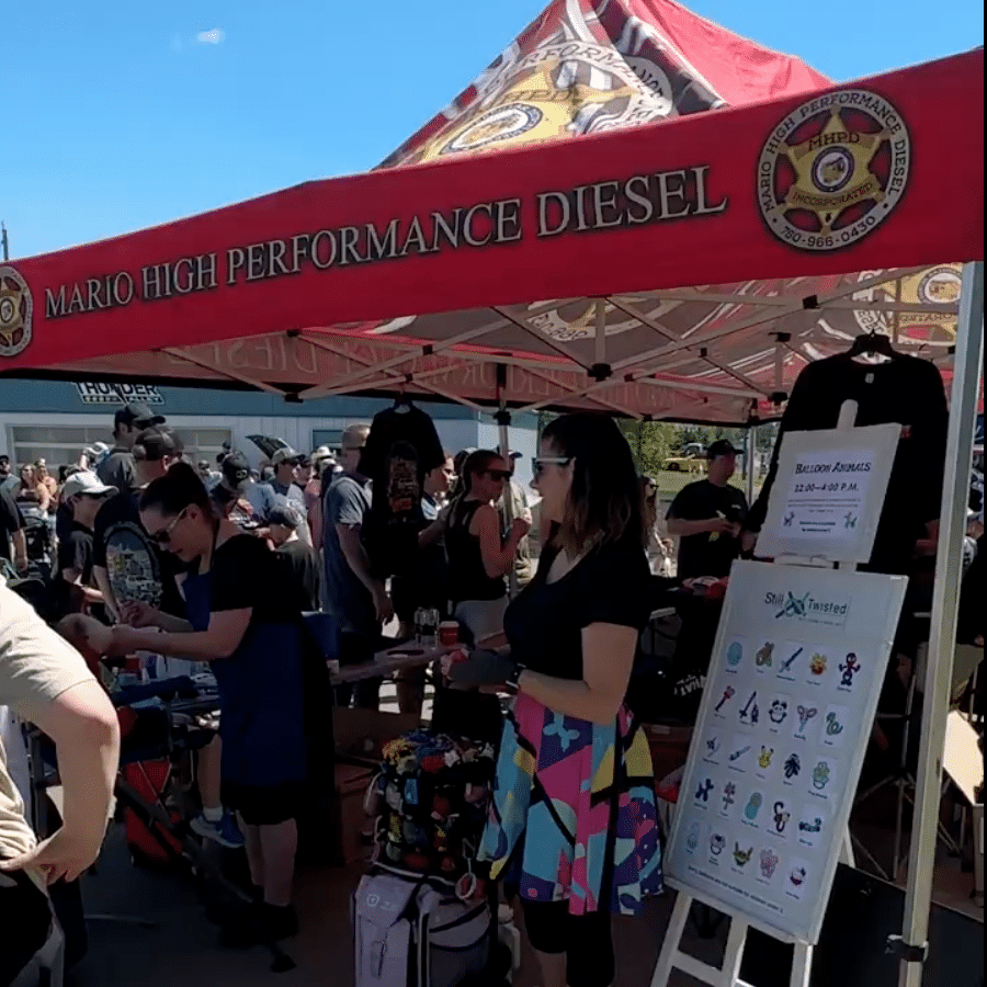 face painting and balloons at alberta diesel day
